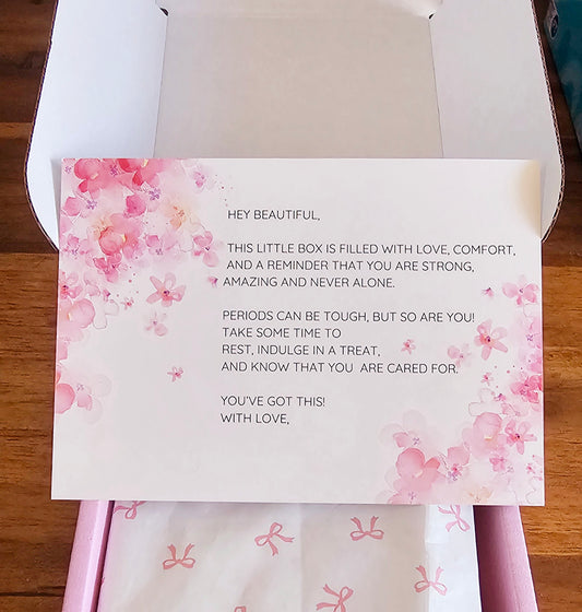Self care period comfort box with pink gift box and care items