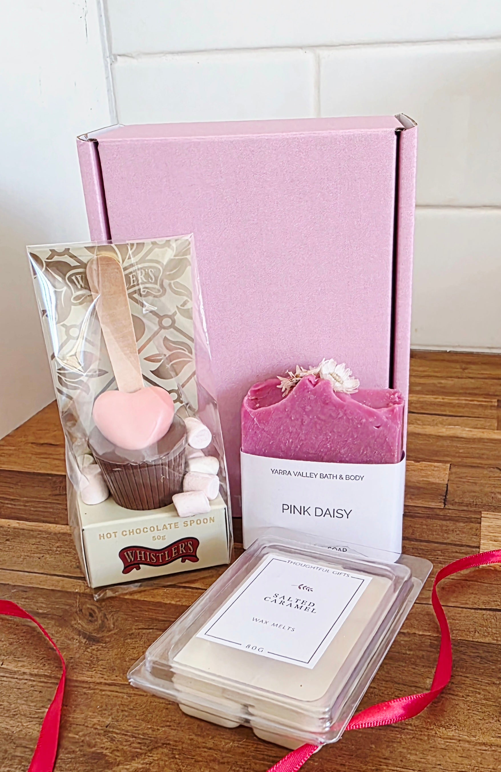 Valentine's gift box set with pink soap, hot chocolates, natural soy wax melts in a pink box 
